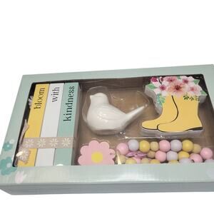 Aldi Finds Spring Tray Objects Rubber Boots, Book Stack, Ceramic Bird & Beads